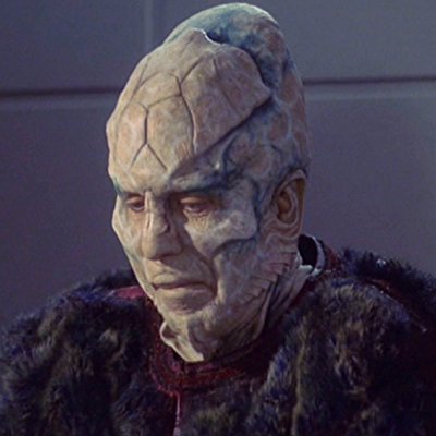 Alien Trader D'Marr, Coridan Ambassador